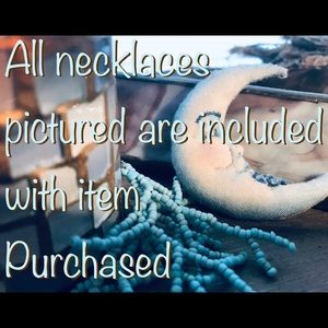 Necklaces are free with purchase